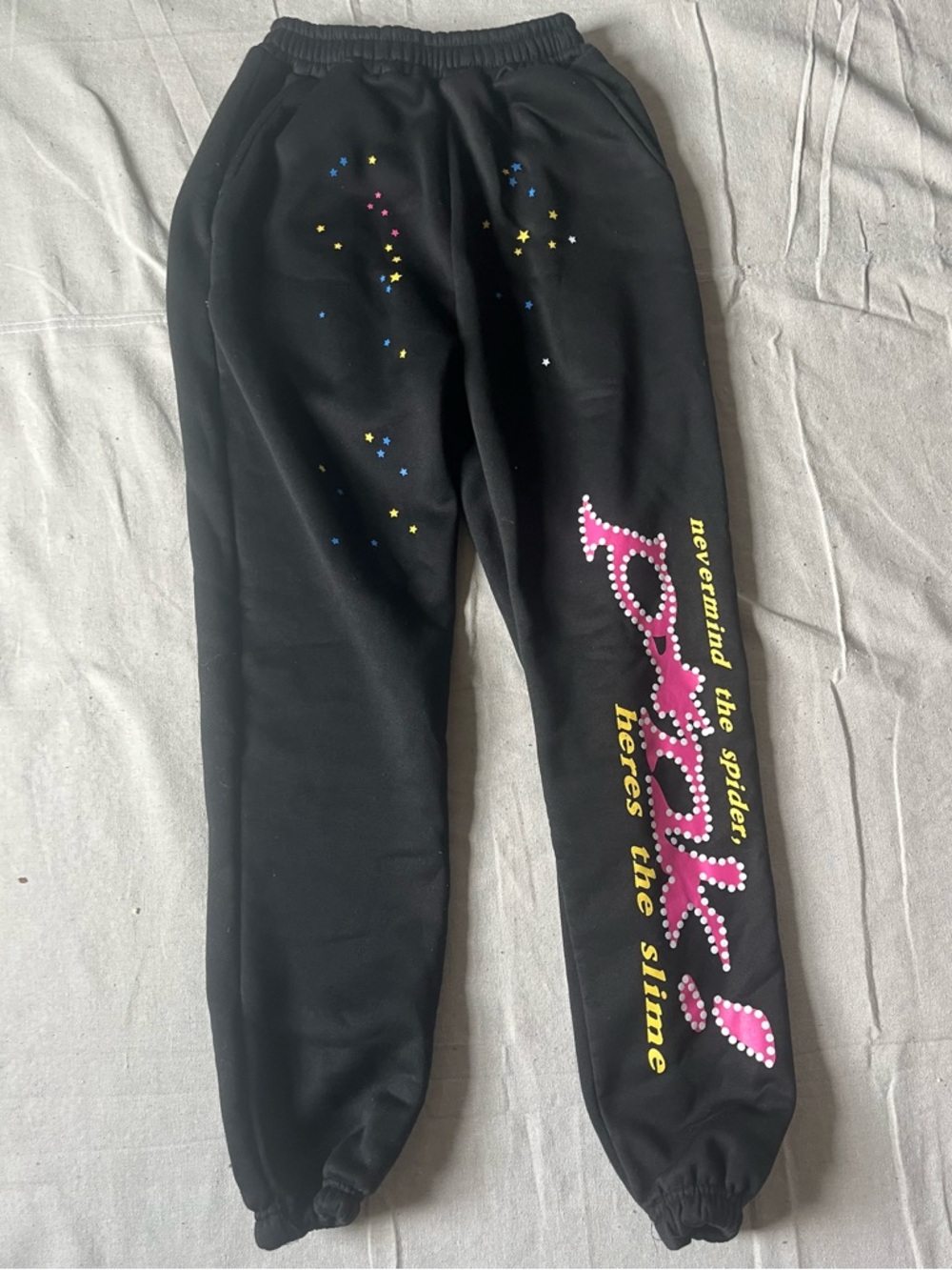 Men’s Sp5der Black Jogger Sweatpants with Pink & Yellow Graphic
